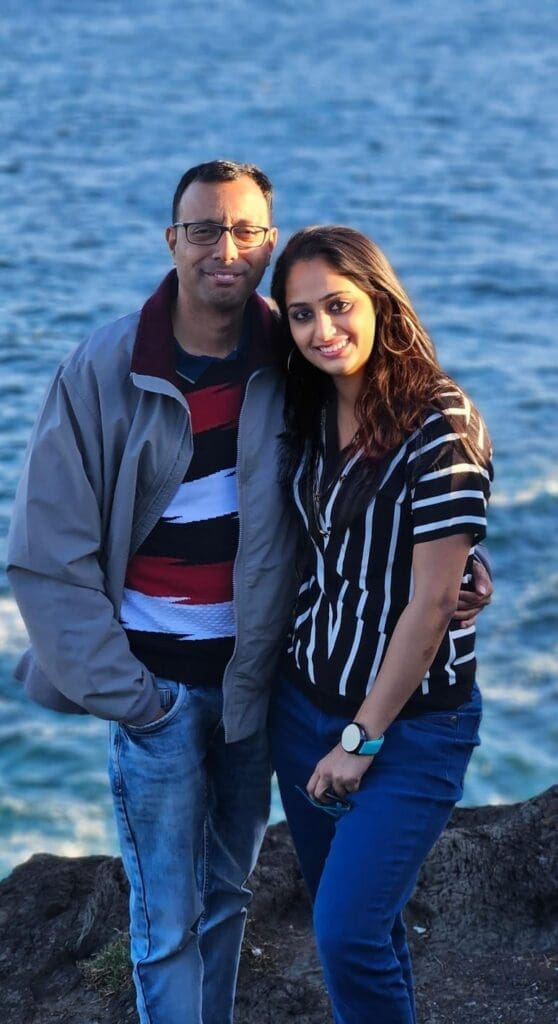 a couple posing for a photo